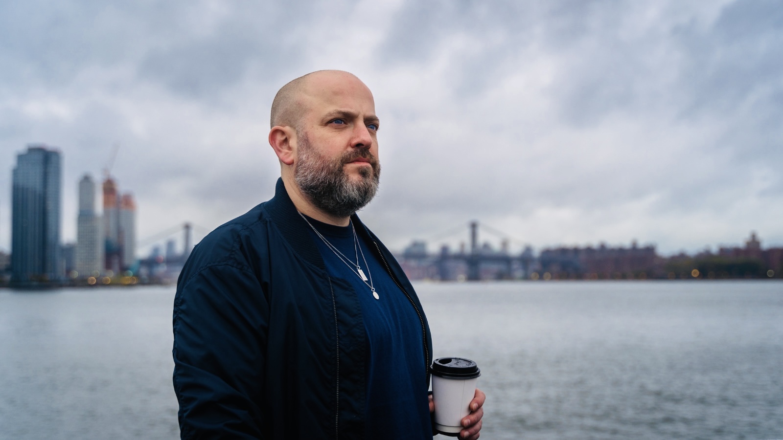 Jack Strickland beside the River Thames in London
