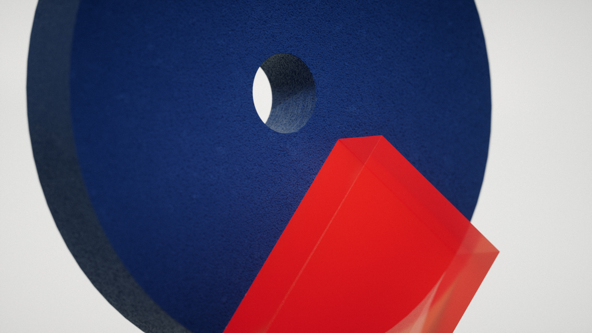 Abstract 3D render: a textured blue-black disc with a circular hole behind a translucent red geometric block on a pale grey surface