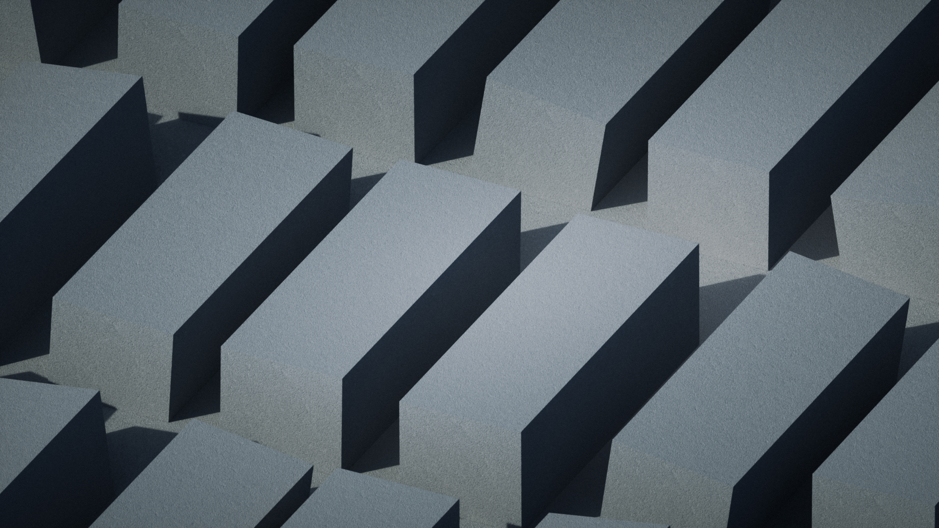 Abstract composition of parallel grey geometric forms with dark faces and shadows